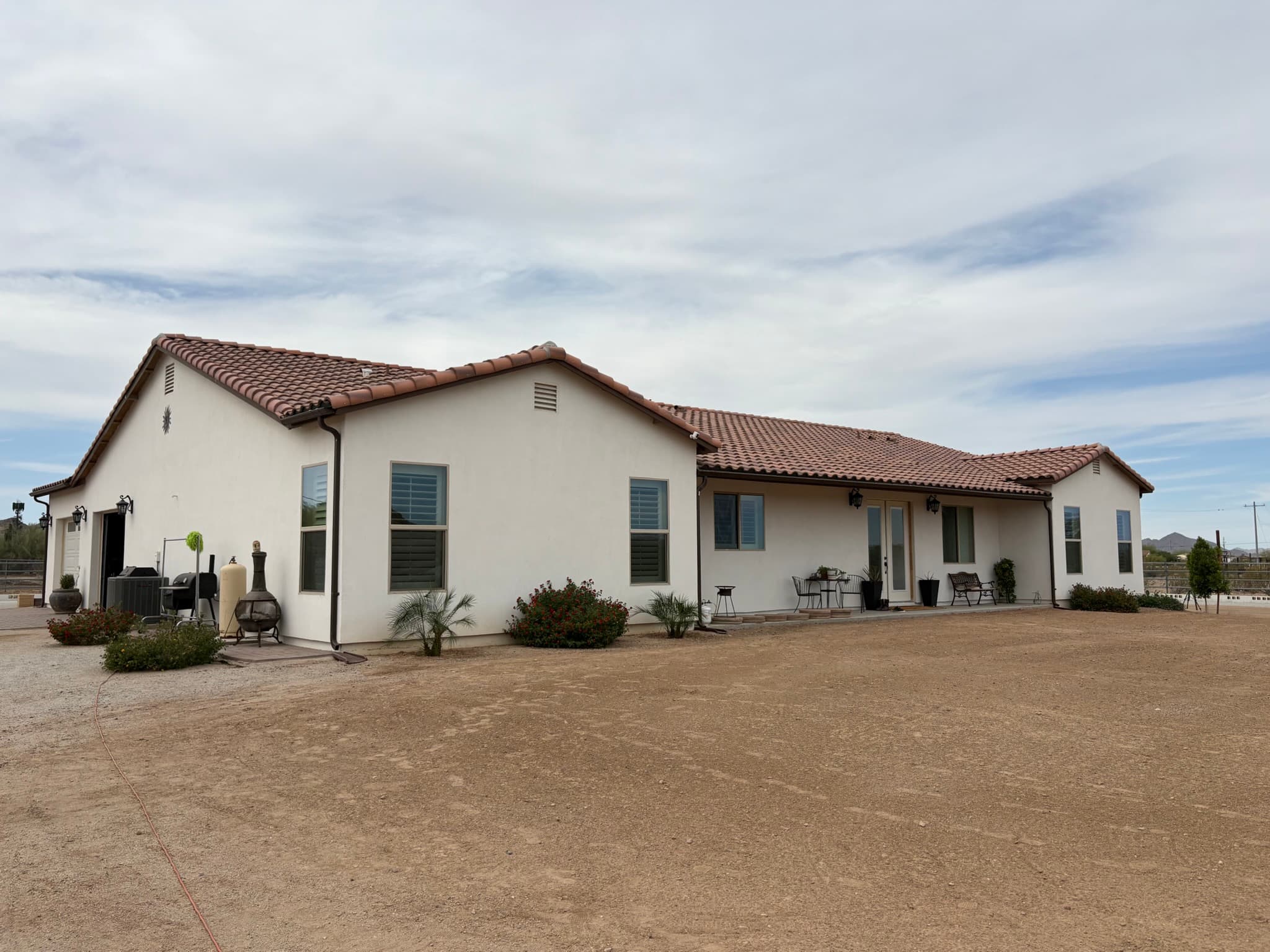 Completed home exterior rear and side elevation after construction work
